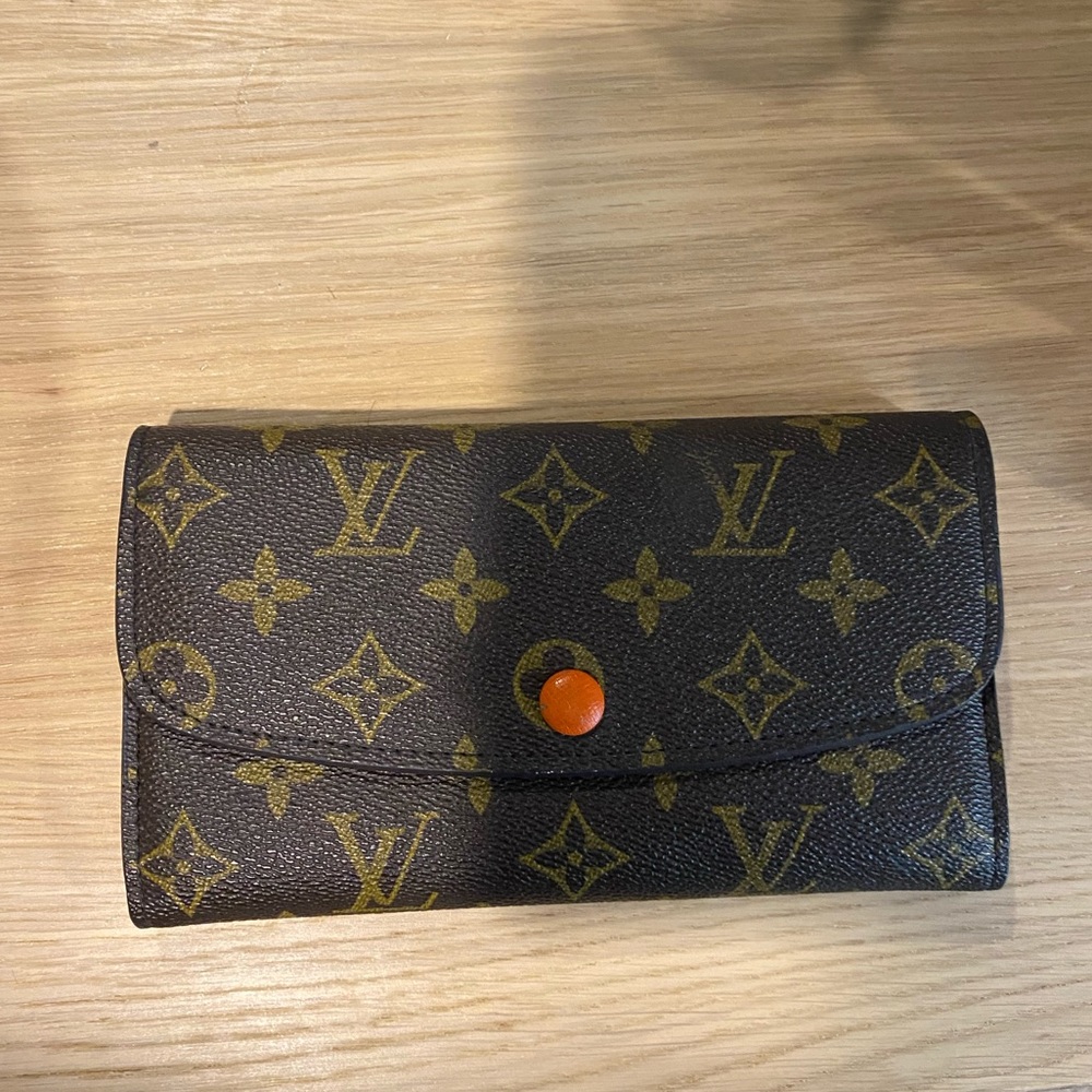 Louis Vuitton monogram emilie wallet orange and brown